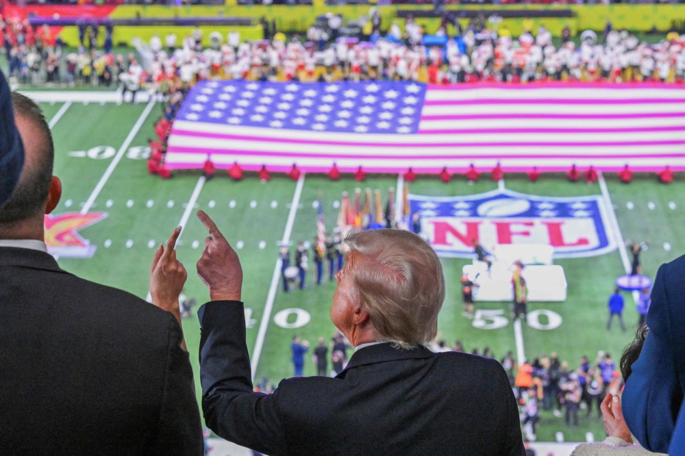 US President Donald Trump watch the pre-game show  before Super Bowl LIX between the Kansas City Chiefs and the Philadelphia Eagles at Caesars Superdome in New Orleans, Louisiana, February 9, 2025. — AFP pic
