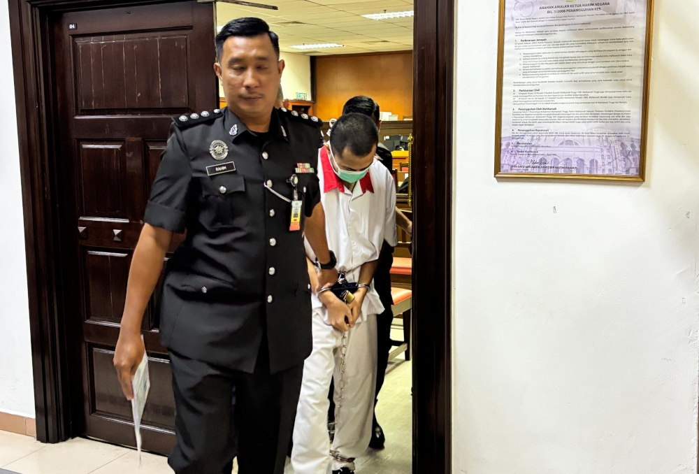 On December 24, last year, 23-year-old e-hailing driver Zakwan Mokhtar was charged under Section 302 of the Penal Code, which carries the death penalty or a minimum 30 years in jail and caning upon conviction. — The Borneo Post pic 