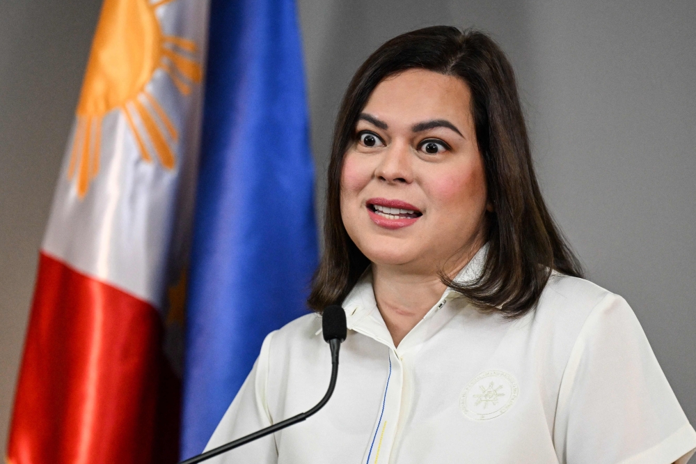 Philippine Vice President Sara Duterte gives a statement on impeachment complaints filed against her at her office in Mandaluyong, Metro Manila on February 7, 2025. Duterte said she had yet to consider stepping down and was still weighing a run for president despite her dramatic impeachment this week by the House of Representatives. — AFP pic