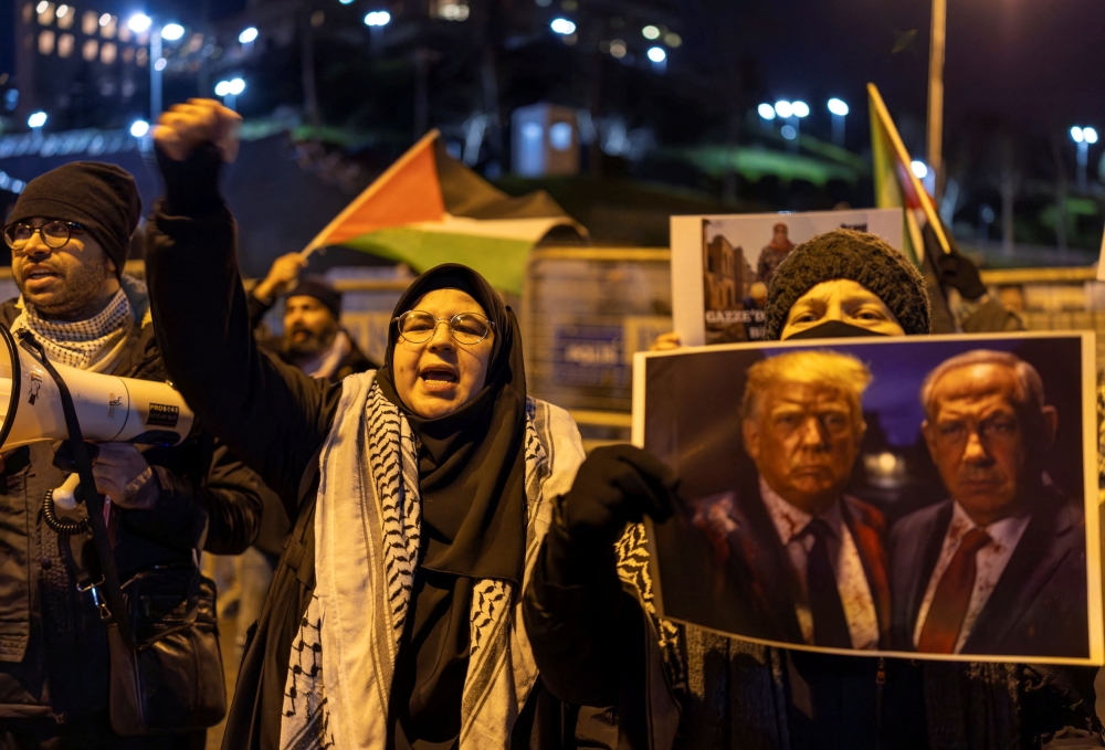 Demonstrators attend a protest against US President Donald Trump’s plan to resettle Palestinians from Gaza, in front of the US consulate in Istanbul February 6, 2025. — Reuters pic  