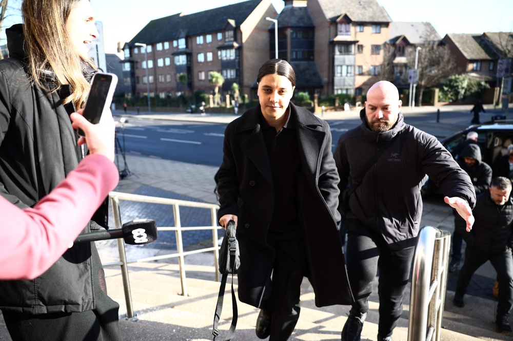 Chelsea’s Australian striker Sam Kerr arrives at Kingston Crown Court in south London on February 6, 2025 after being charged with causing racially aggravated harassment to police officer Stephen Lovell during an incident in south-west London in the early hours of January 30, 2023. — AFP pic