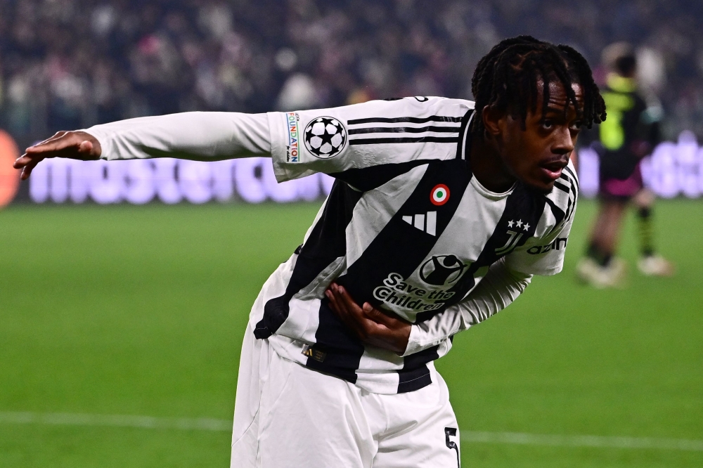 Samuel Mbangula takes a bow after scoring Juventus’ second goal during the UEFA Champions League knockout playoff against PSV Eindhoven at the Allianz stadium in Turin, on February 11, 2025. — AFP pic