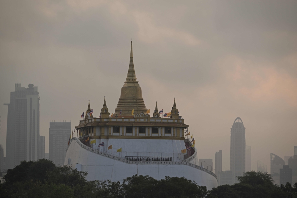 The Wat Saket in Bangok was visibleon February 7, 2025, but Thailand’s air quality has been increasingly smoggier in the past few days and the country’s Geo-Informatics and Space Technology Development Agency has placed a red alert warning on hazardous levels on February 12, 2025. — AFP pic