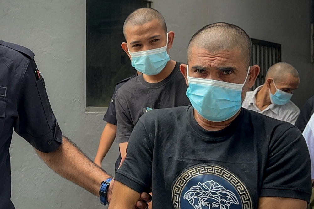 Two Indonesian men pleaded not guilty at the Sessions Court here today to charges of trafficking firearms last month. — Bernama pic