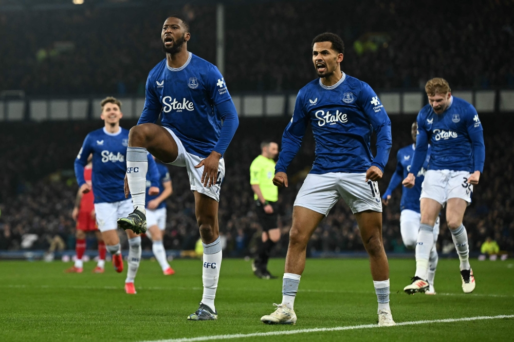 Everton's Portuguese striker Beto (left) celebrates scoring the opening goal with Senegalese striker Iliman Ndiaye during the English Premier League football match with Liverpool at Goodison Park. — AFP pic