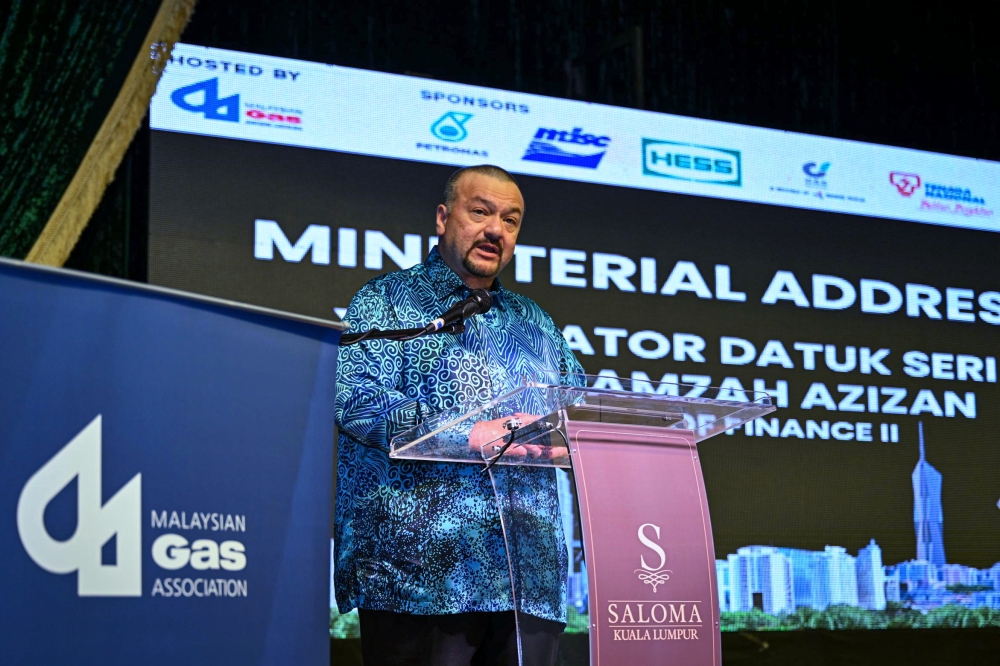 Minister of Finance II Datuk Seri Amir Hamzah Azizan delivers his speech during the International Gas Union (IGU) Executive Committee Meeting Gala Dinner in Kuala Lumpur February 12, 2025. — Bernama pic