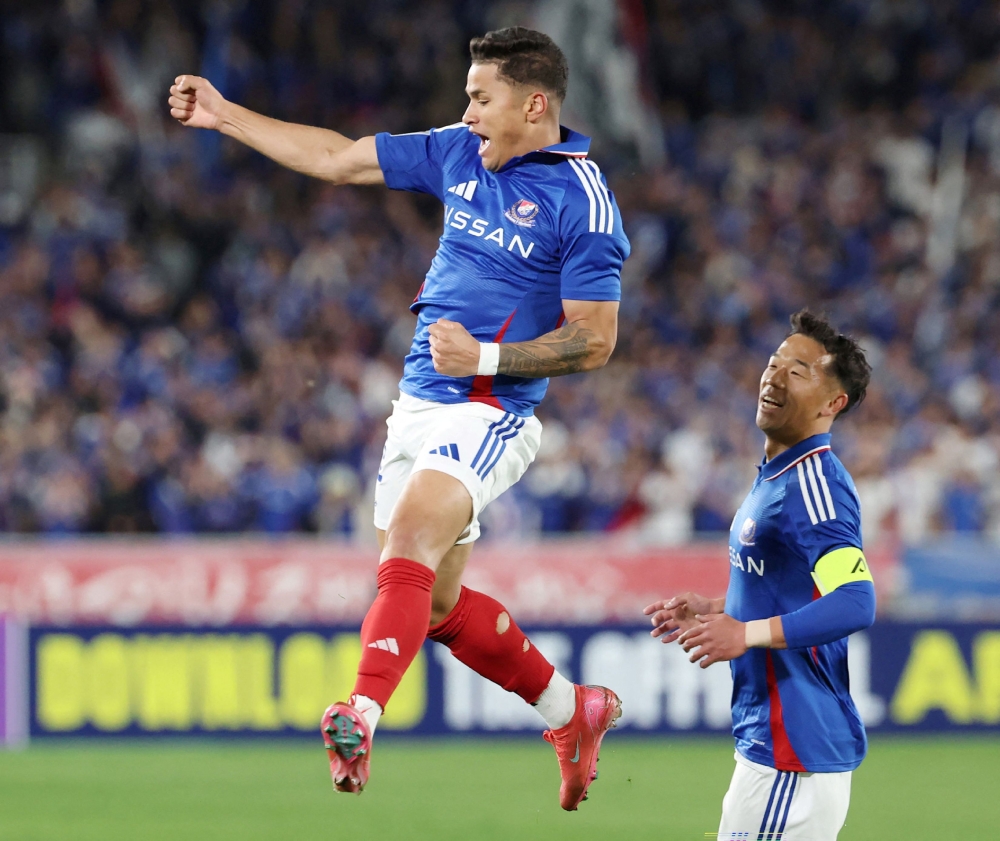 Yokohama’s Yan Matheus (left) celebrates after scoring during the AFC Champions League football match between Japan’s Yokohama F. Marinos and China’s Shanghai Shenhua in Yokohama, Kanagawa prefecture on February 12, 2025. — AFP pic