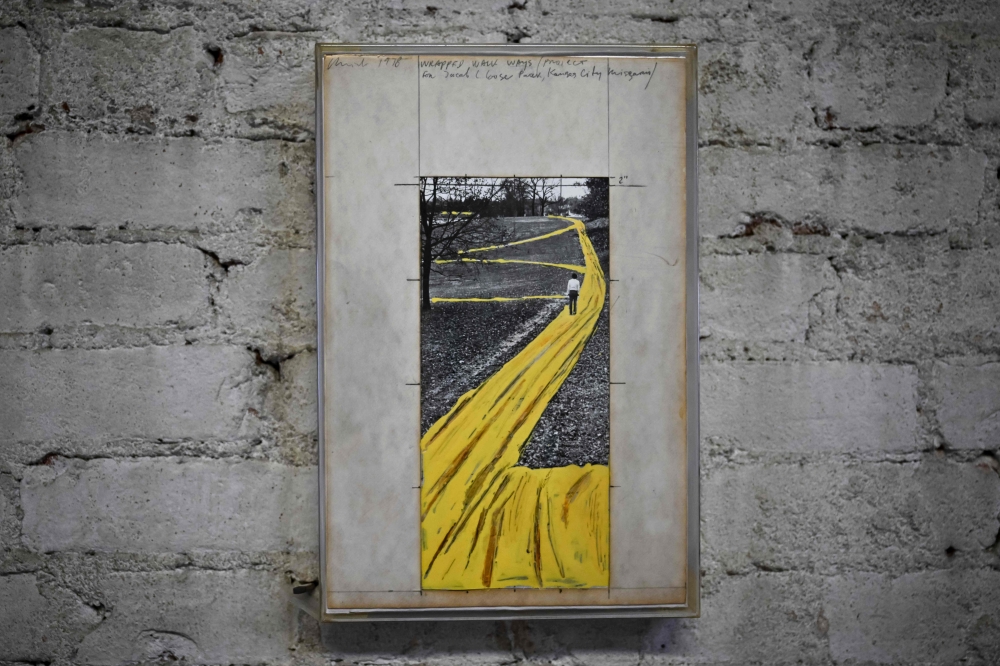 A drawing of Christo hangs on the wall at Christo Vladimirov Javacheff and Jeanne-Claude Denat de Guillebon, known as Christo and Jeanne-Claude artists studio in New York City on February 5. — AFP pic