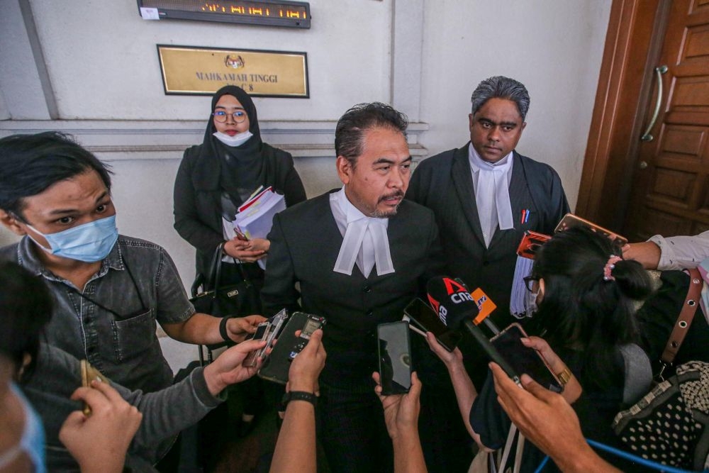 File photo of lawyer Rosli Dahlan speaking to reporters at the Kuala Lumpur High Court on July 9, 2020. — Picture by Hari Anggara