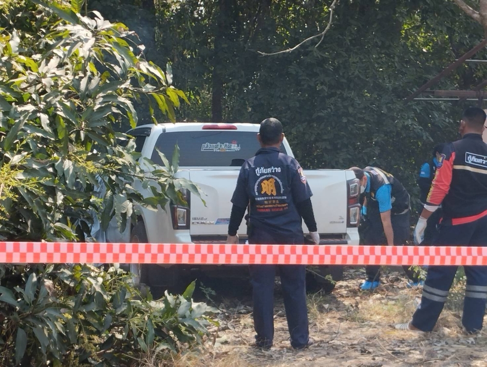 The bodies of a man, woman, and a boy were discovered inside a white Isuzu D-Max pickup truck parked near a deserted house in Khlong Khlung district in Kampaeng Phet province, central Thailand. — Picture from Facebook/บ้านเด่นสะเดา