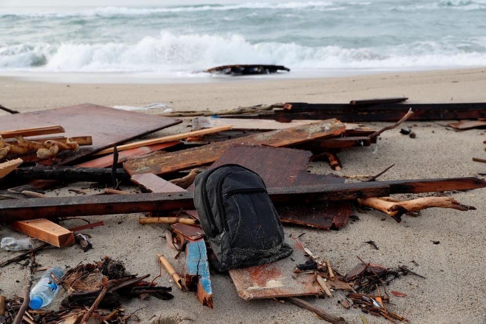 A view of the wreckage of a shipwreck in southern Italy which has left dozens of migrants dead after the boat in which they were travelling smashed onto the rocks, in Cutro, Italy February 27, 2023. — File picture via Reuters