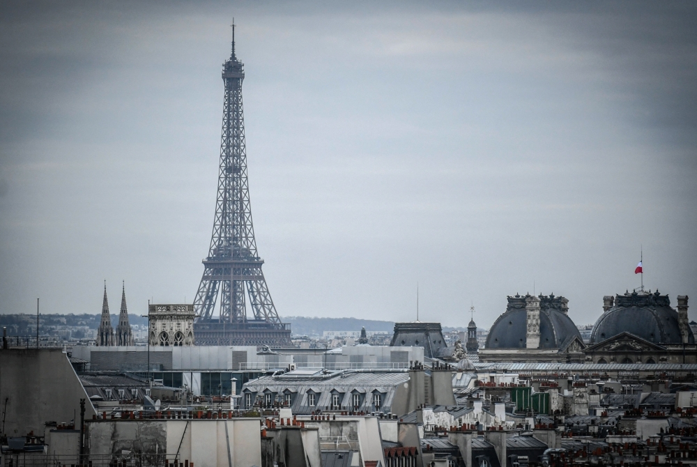 This photograph taken on February 6, 2024, shows a view of the Eiffel tower in Paris. Rock ‘n’ roll icon Jim Morrison will have a central Paris footbridge named after him, the city has decided. — AFP pic