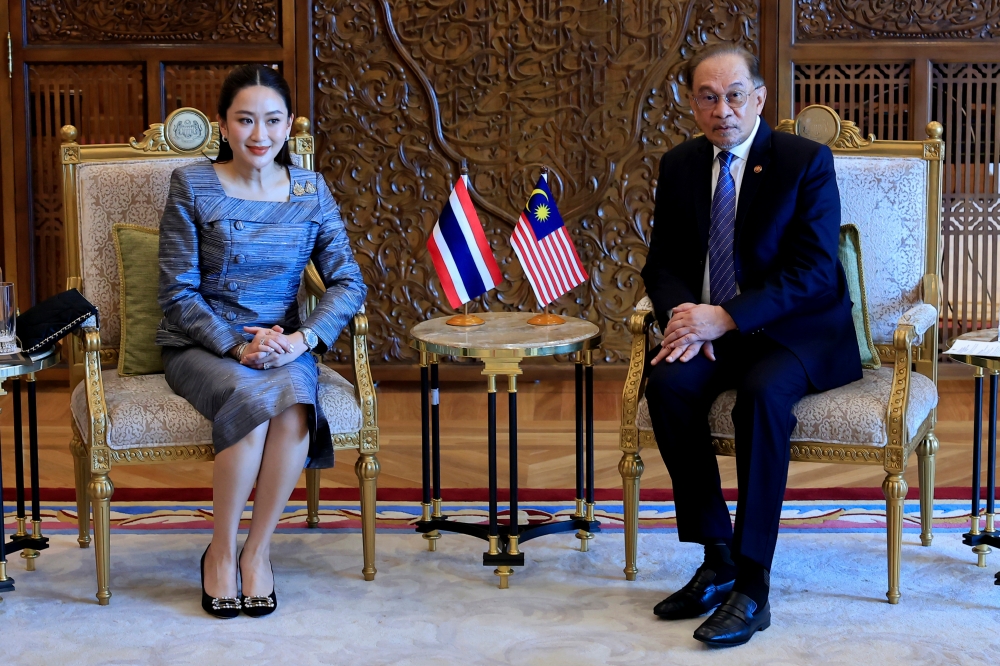 Prime Minister Datuk Seri Anwar Ibrahim holds a meeting with Thai Prime Minister Paetongtarn Shinawatra at his office in Putrajaya December 16, 2024. — Bernama pic