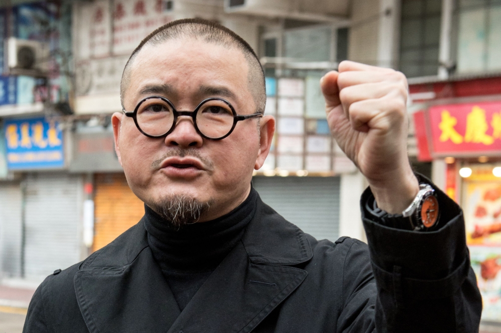 Shiu Ka-chun gestures during the Umbrella Movement protest in Hong Kong on March 26, 2017. — AFP file pic