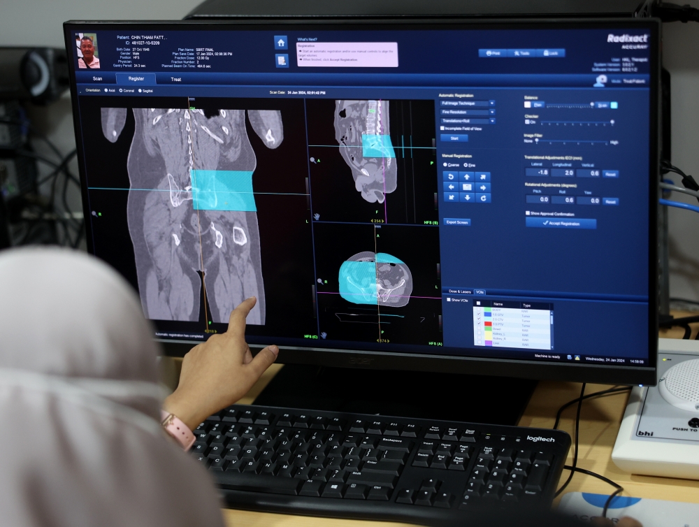 A file photograph shows a radiologist performing a cancer screening at the Department of Radiotherapy and Oncology in Hospital Kuala Lumpur (HKL). — Bernama pic