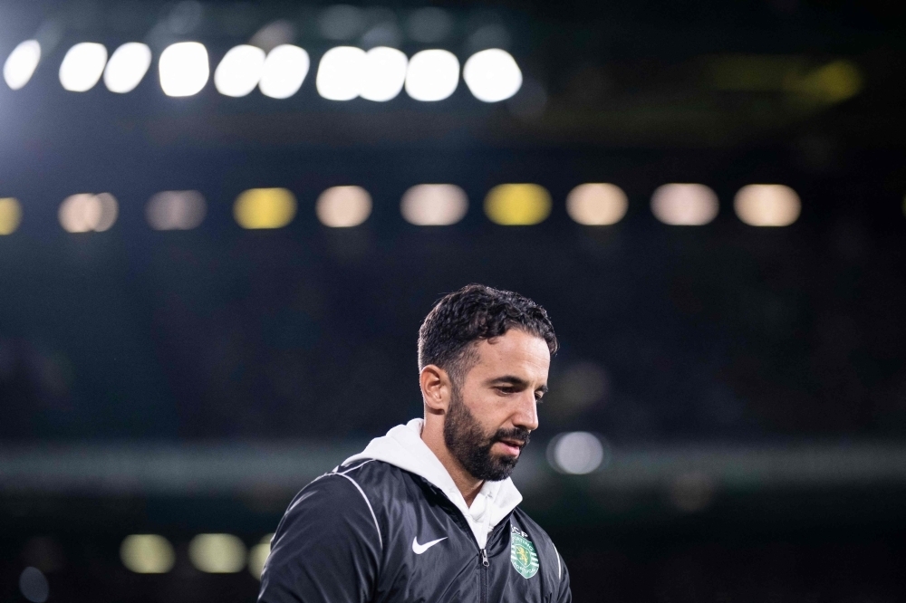 Ruben Amorim believes his team’s faltering fortunes on the pitch are partly responsible for the job cuts which have swept through Old Trafford. — File pic by AFP 