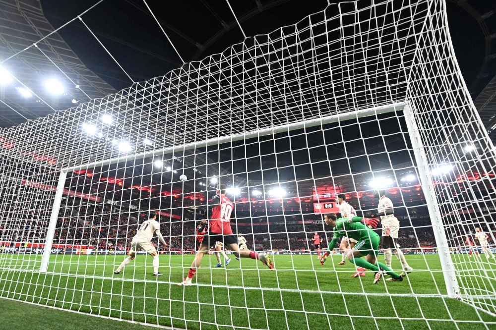 Bayern Munich's Manuel Neuer goes for the ball. — Pic by AFP