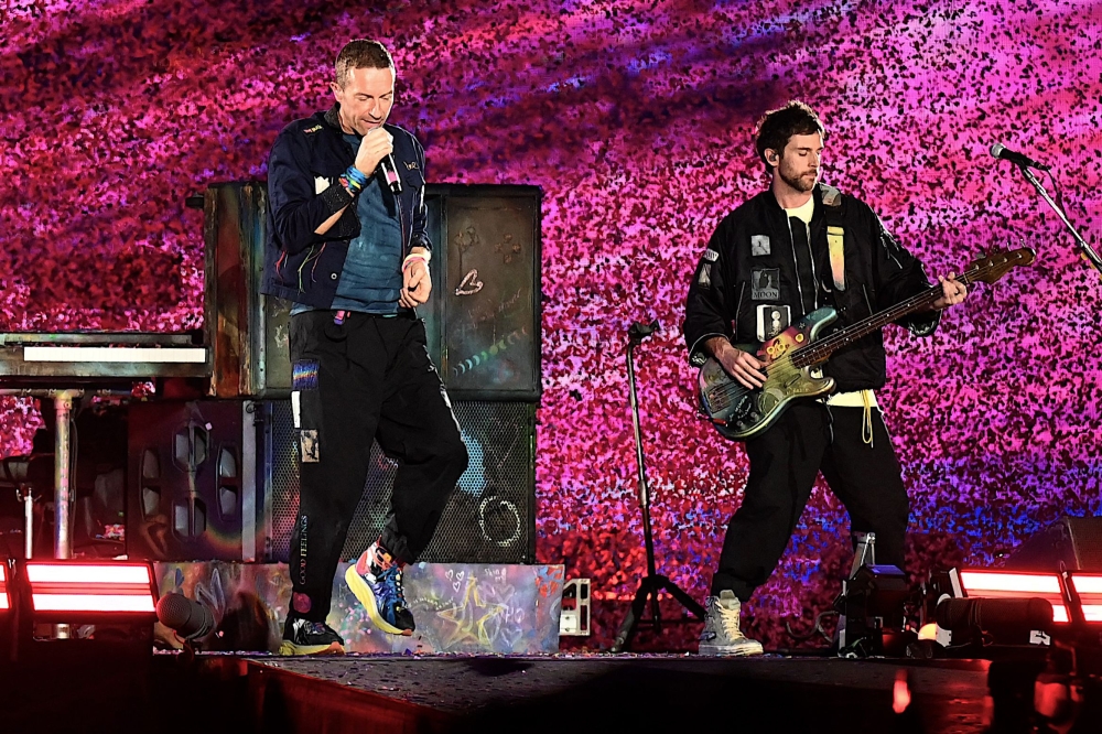 British rock band Coldplay performs onstage during a concert as part of their Music of the Spheres World Tour, at the DY Patil stadium in Navi Mumbai, India on January 18, 2025. — AFP pic
