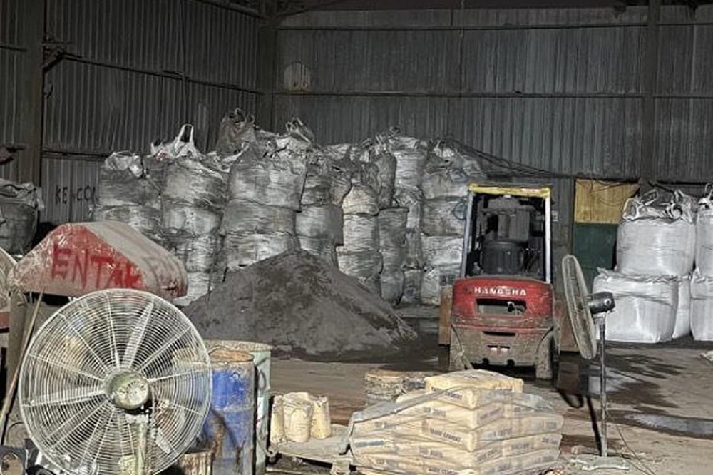 Police uncovered an illegal e-waste storage and processing facility in Johor, believed to be handling imported e-waste, and seized materials worth RM71.5 million during an operation on Friday. — Picture courtesy of police