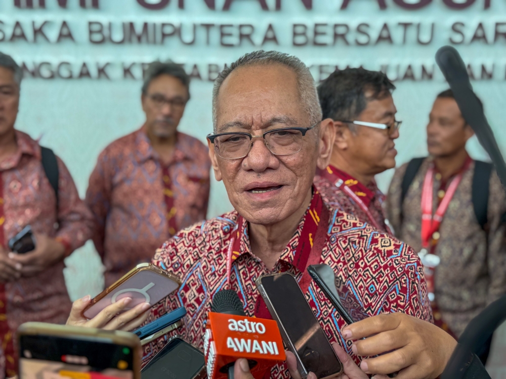 Datuk Ibrahim Baki speaks to reporters during the PBB Convention in Kuching February 16, 2025. — The Borneo Post pic