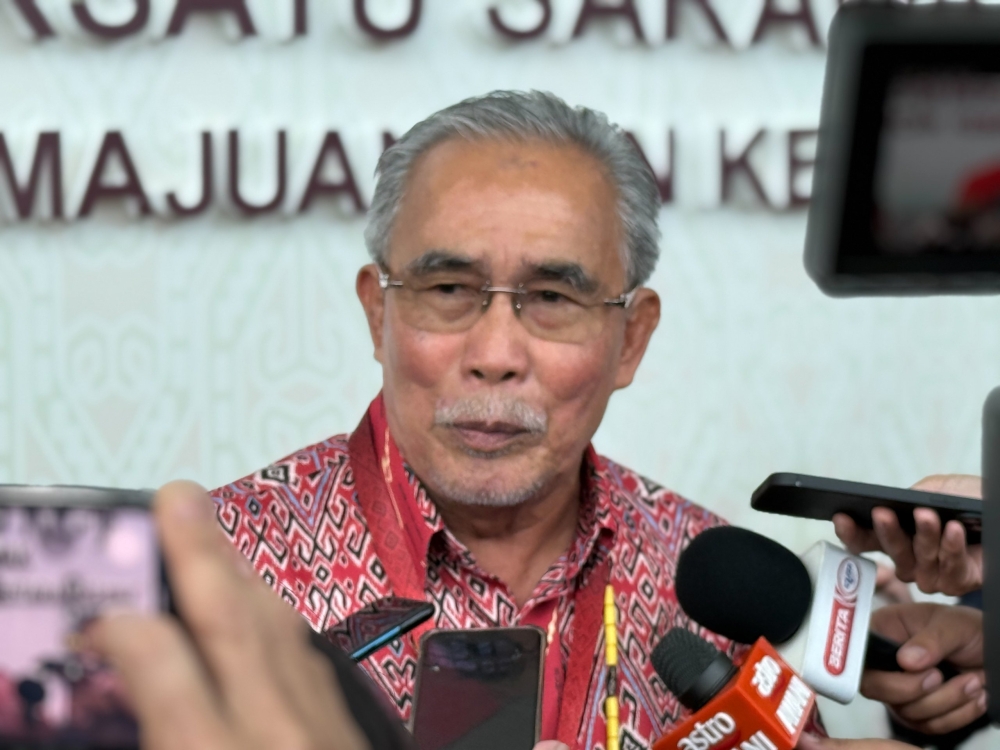 Datuk Len Talif Salleh speaks to reporters during the PBB Convention in Kuching February 16, 2025. — The Borneo Post pic