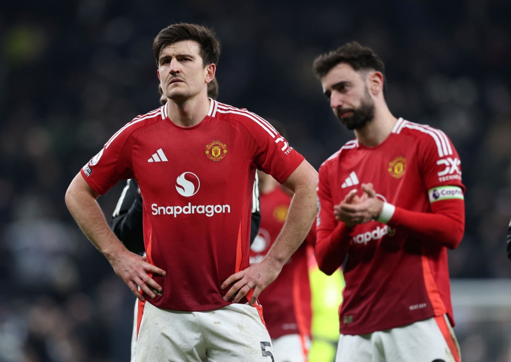Manchester United's Harry Maguire and Bruno Fernandes react after their match against Tottenham Hotspur in London on Feb 16, 2025. — Reuters pic
