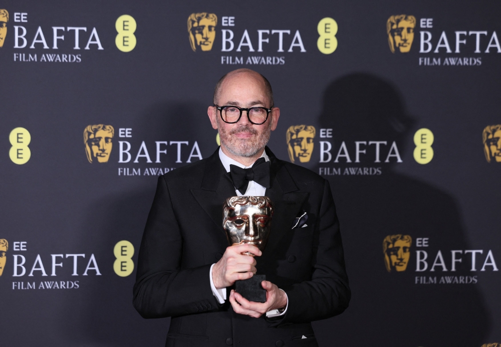 Director Edward Berger poses with the award for the Outstanding British Film Award for ‘Conclave’. — Reuters pic
