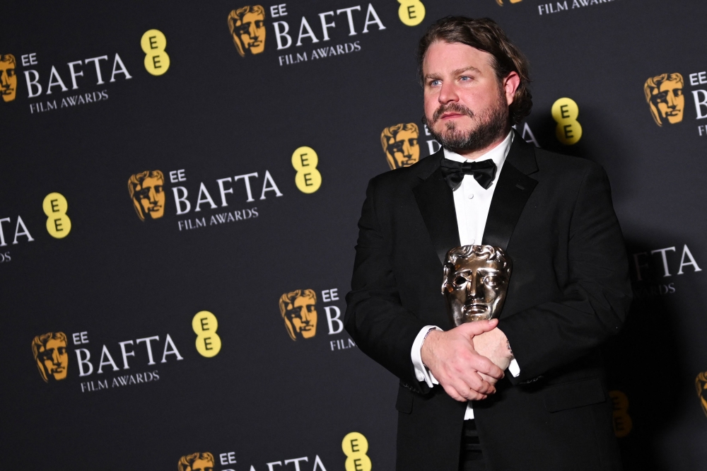 US director Brady Corbet poses with the award for Best director for ‘The Brutalist’. — AFP pic 