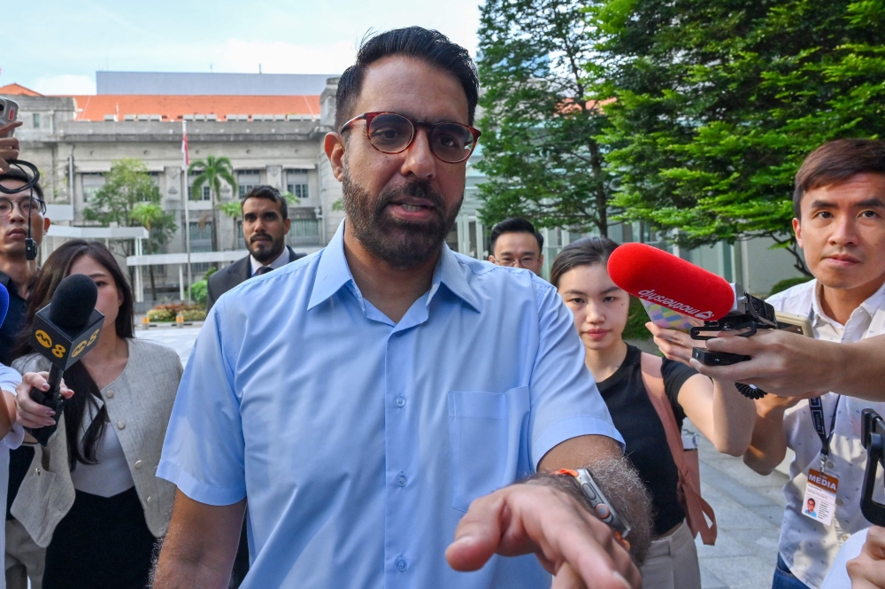 Pritam Singh, secretary-general of the opposition Workers’ Party, arrives at the State Court to face the verdict in his trial for allegedly lying to the Committee of Privileges (COP) in Singapore on February 17, 2025. — AFP pic 