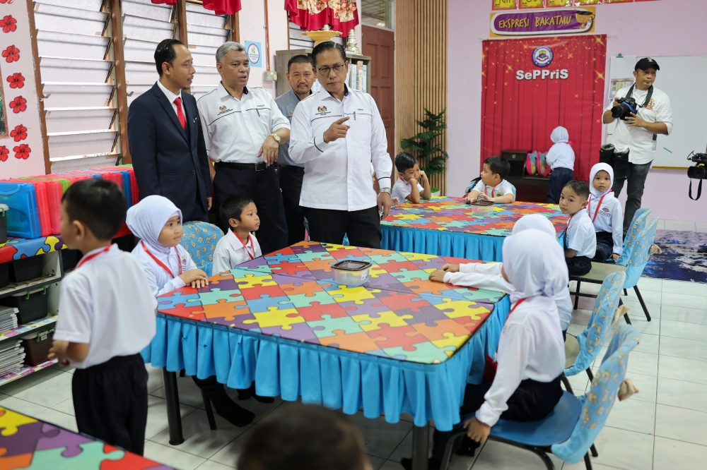 Education Director-General Azman Adnan looks at a pre-school learning session during a working visit to Sekolah Kebangsaan Taman Seri Pagi in conjunction with the first day of the 2025-2026 school year session February 17, 2025. — Bernama pic