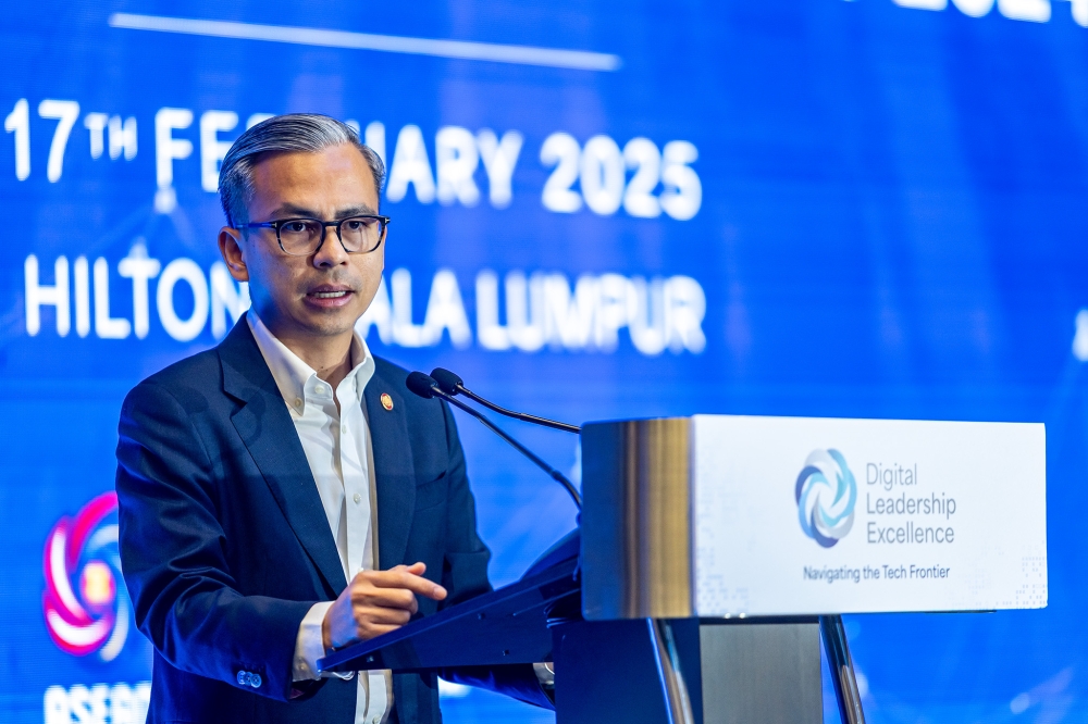 Communications Minister Fahmi Fadzil reminded social media users to be moderate when expressing opinions on racial matters online. — Picture by Firdaus Latif