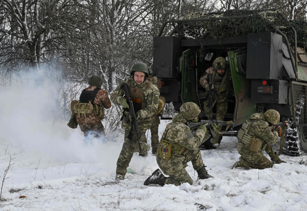 Ukrainian servicemen from the 24th Mechanised Brigade conduct field training with a French made VAB armoured personnel carrier (APC), in an undisclosed location in the Donetsk region, on February 16, 2025, amid the Russian invasion of Ukraine. — AFP pic 