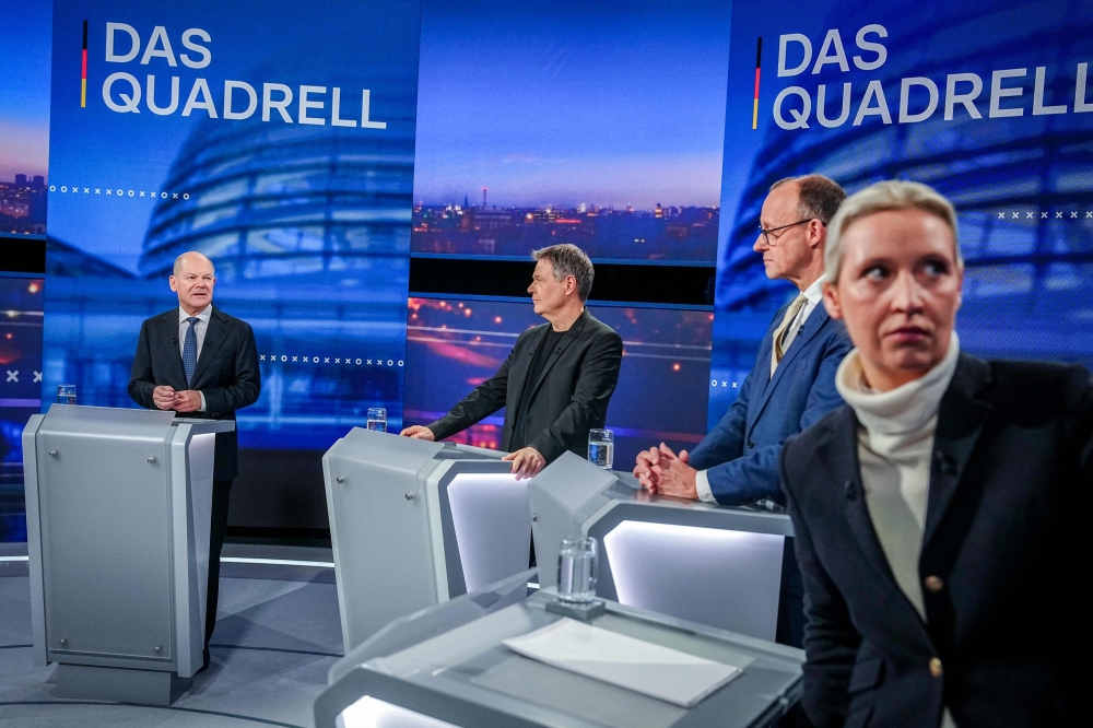 (Left to tight) German Chancellor Olaf Scholz, Green Party's main candidate and German Minister of Economics and Climate Protection Robert Habeck, Christian Democratic Union (CDU) chairman Friedrich Merz, the far-right Alternative for Germany (AfD) co-leader Alice Weidel take part in a TV debate in Berlin on February 16, 2025. — Reuters pic
