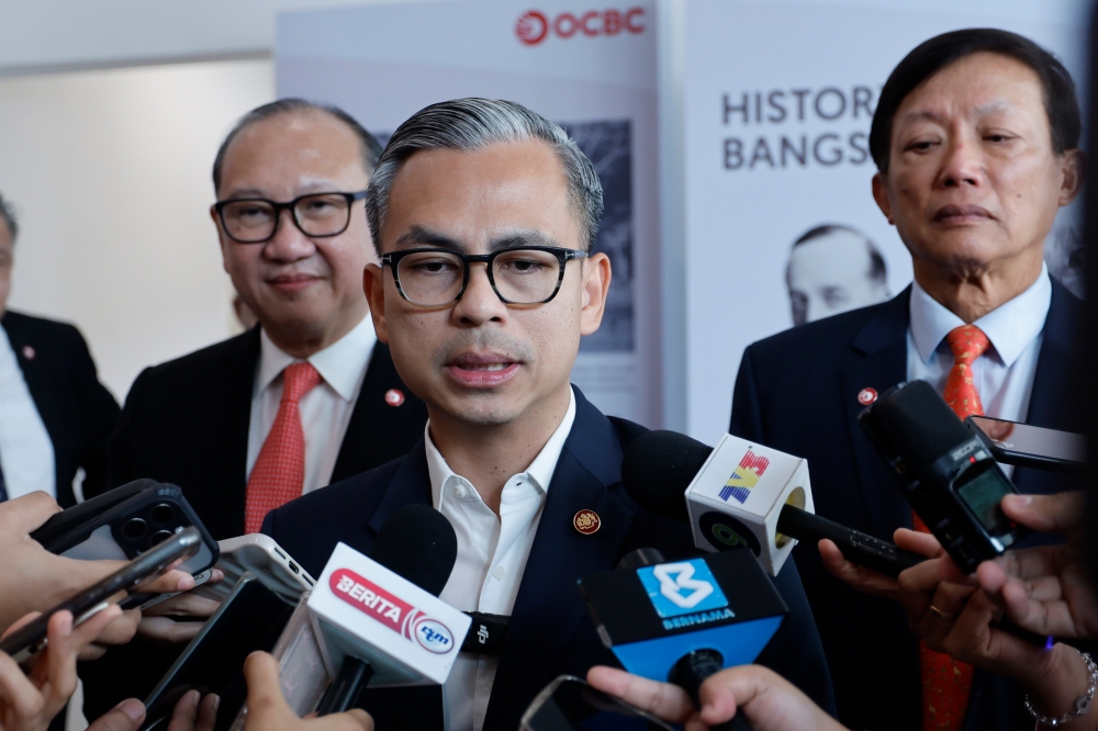 Communications Minister Fahmi Fadzil said the government will take firm action against any television station that violates established guidelines. — Bernama pic