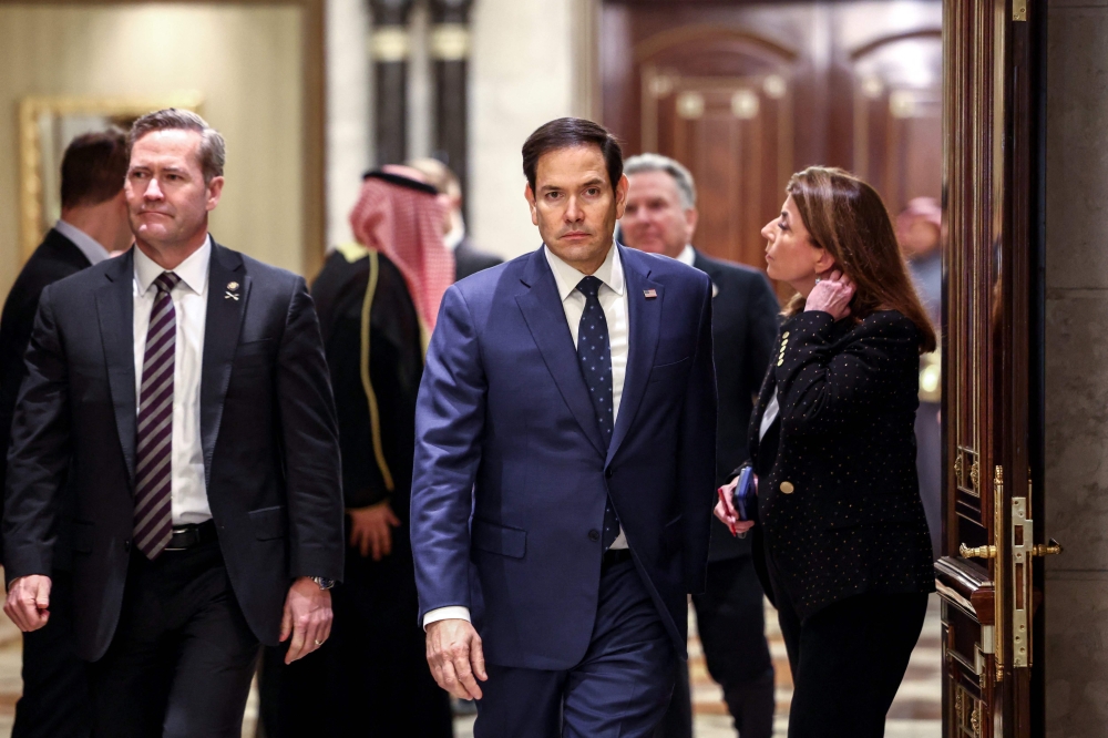 US Secretary of State Marco Rubio (right), US National Security Advisor Mike Waltz (left) and US Middle East envoy Steve Witkoff (back right) attend an interview after meeting with Russian Foreign Minister Sergei Lavrov and Russian President Vladimir Putin's foreign policy adviser Yuri Ushakov, at Diriyah Palace, in Riyadh, Saudi Arabia, on February 18, 2025. — AFP pic 