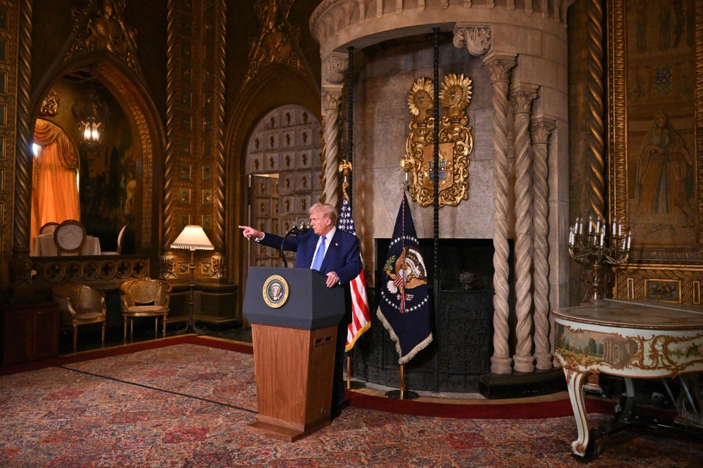 US President Donald Trump takes a question as he speaks during the signing of executive orders at his Mar-a-Lago resort in Palm Beach, Florida, on February 18, 2025. — AFP pic 