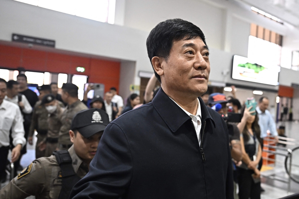 Chinese Public Security Assistant Minister Liu Zhongyi is seen at Mae Sot International Airport in Tak province on Monday after visiting the Thai-Myanmar border as the three countries discuss returning people allegedly working at scam compounds in Myanmar's border towns. — Pic by AFP