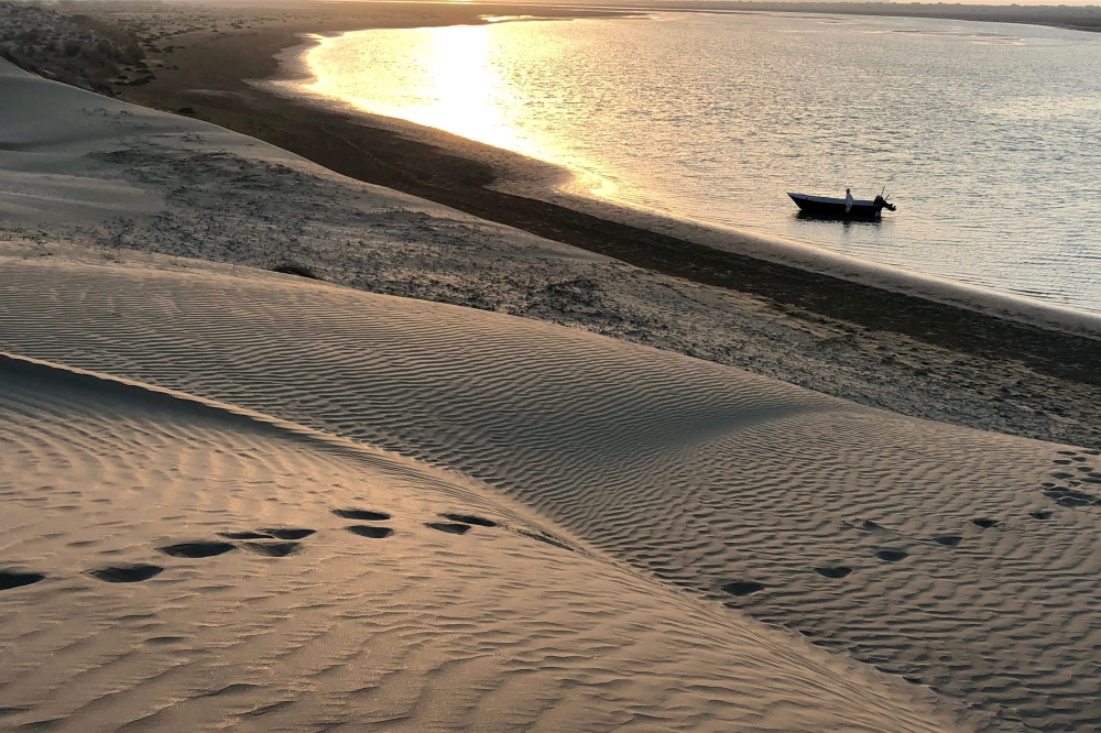 Desert meets sea near the village of Bandar-e Tang in Iran's southern Sistan-Baluchistan province, on October 3, 2018. — AFP pic