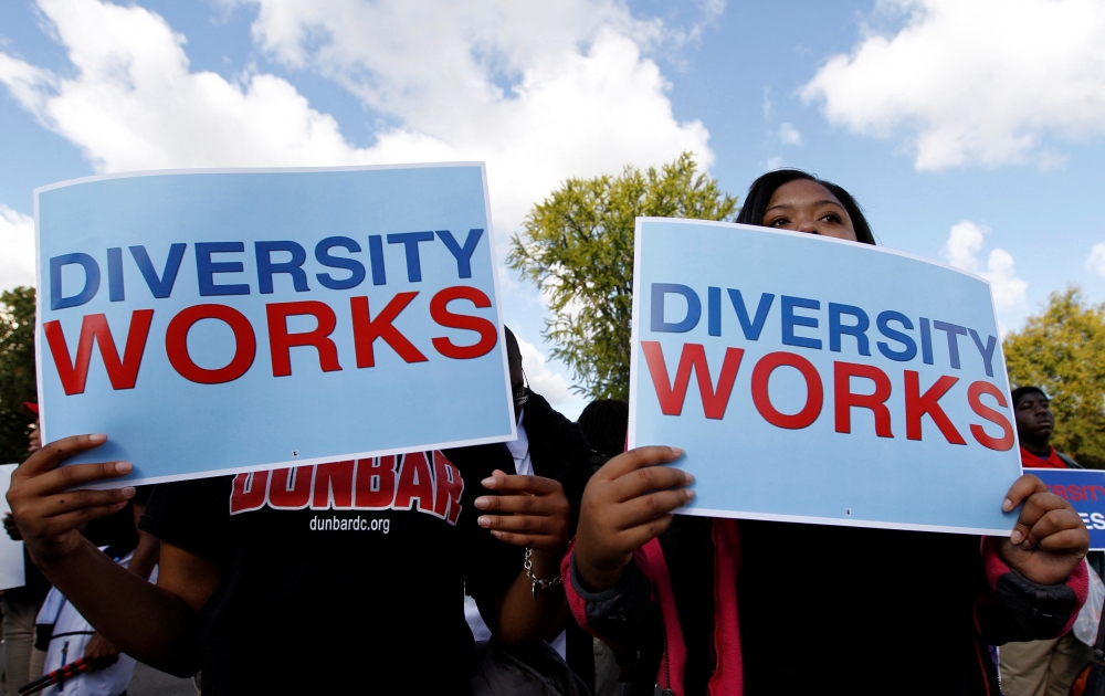 Students calling for diversity protest outside the U.S. Supreme Court in Washington October 10, 2012. — Reuters pic
