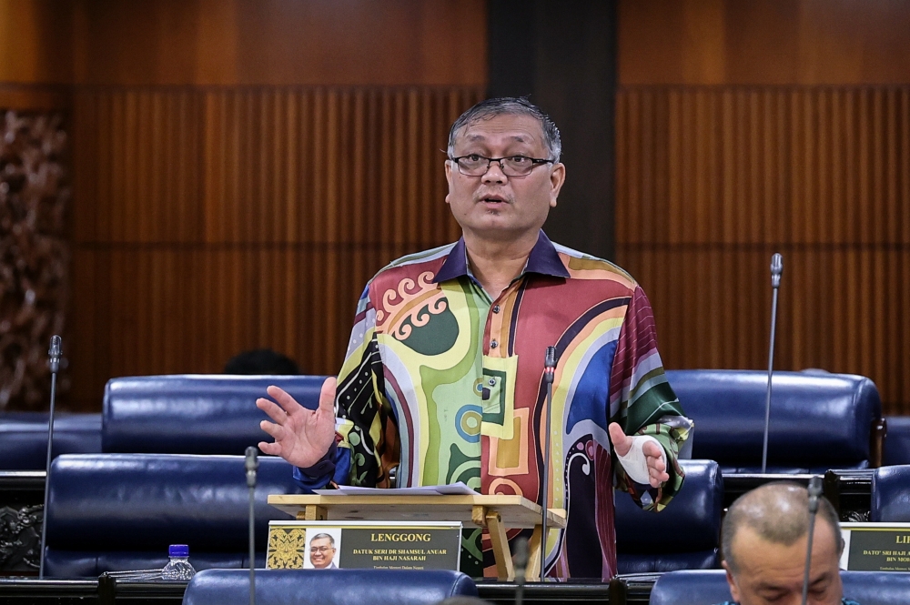 Deputy Home Minister Datuk Seri Dr Shamsul Anuar Nasarah said that of those arrested, 320 individuals had been charged in court under Regulation 25(1)(e) of the National Registration Regulations 1990. — Bernama pic