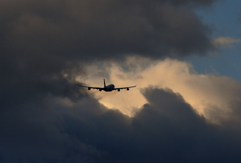 A Venezuelan Conviasa airlines plane, carrying 177 migrants, takes off from US military base of Palmerola in Comayagua, Honduras. — Pic by AFP