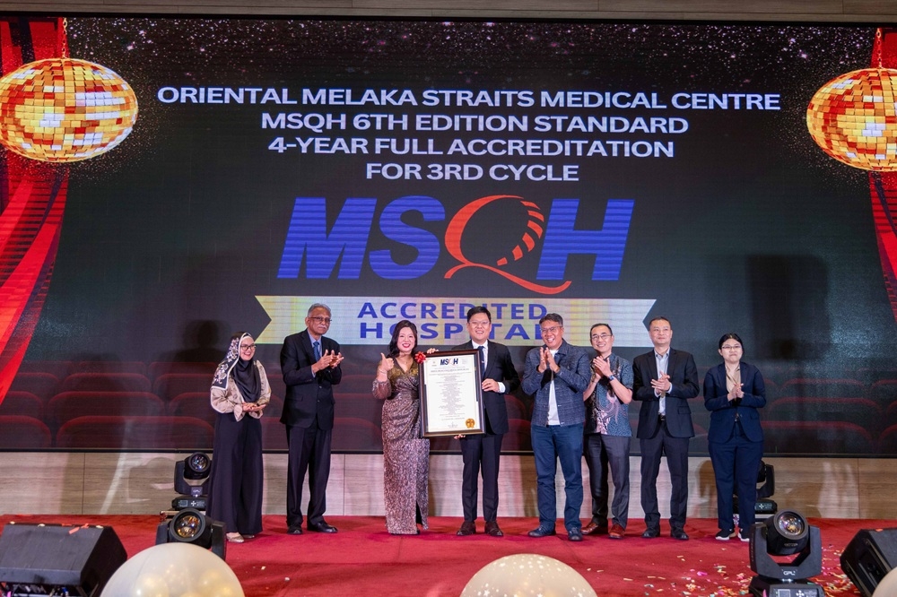 MSQH CEO Datuk Heric Corray (2nd left) presents the MSQH 6th Edition Standard Accreditation to OMSMC Managing Director Dr Tan Hui Ling and Deputy Group Managing Director of Oriental Holdings Berhad, Datuk Seri Datuk Wira Tan Hui Jing. Joining them on stage to celebrate this prestigious achievement are OMSMC CEO Lee Soon Teck, Medical Director Dr Ong Kheng Wah, OMSMC MDAC Chairman Dr Chan Kin Hup and Assistant Manager of Medical Affairs & Quality Teh Lin Xiang. — Picture courtesy of Oriental Melaka Straits Medical Centre