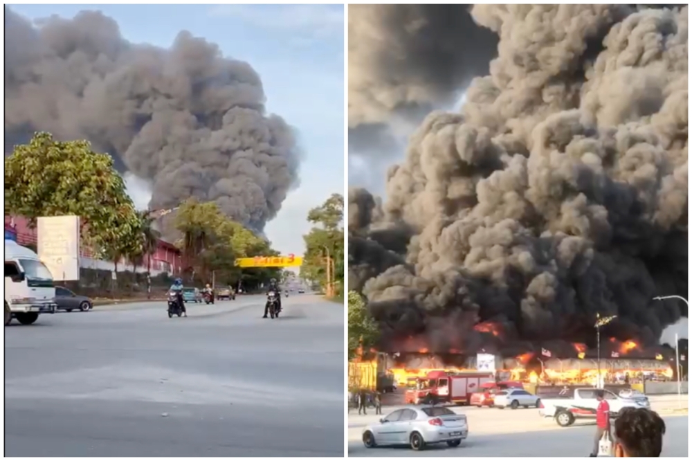 A carpet factory in Nilai 3 was seen on fire this morning. — Screengrab from Facebook/Shamsul Shah TiSha