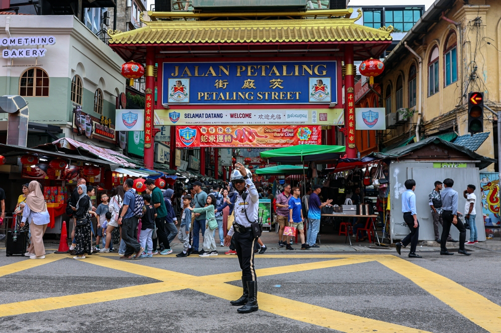 Kuala Lumpur KPDN deputy-director Nurul Syarina Md Anuar said the items, including handbags, belts, wallets, slippers, watches and hats, which were being sold from RM50 to RM450, were seized at 3.30 pm with the help of Kuala Lumpur City Hall (DBKL), the Immigration Department and the police. — Bernama pic  