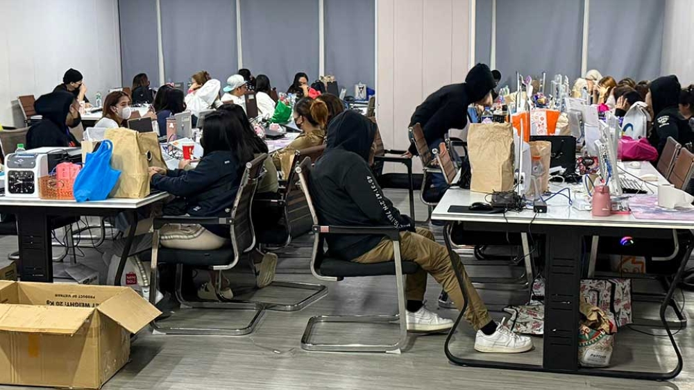 Some of the 453 suspects arrested on February 20, 2025 at a Chinese-run scam center in Manila. –  Image via Philippines Presidential Anti-Organized Crime Commission.