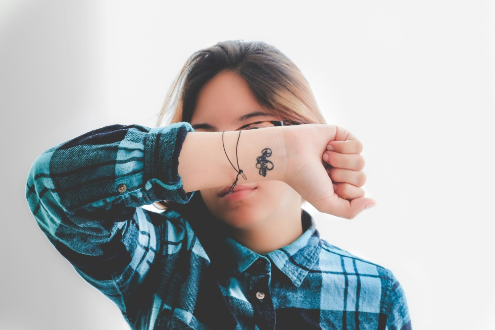 With tattoos now commonplace, regrets are by no means unusual. — Unsplash pic/Angello Pro