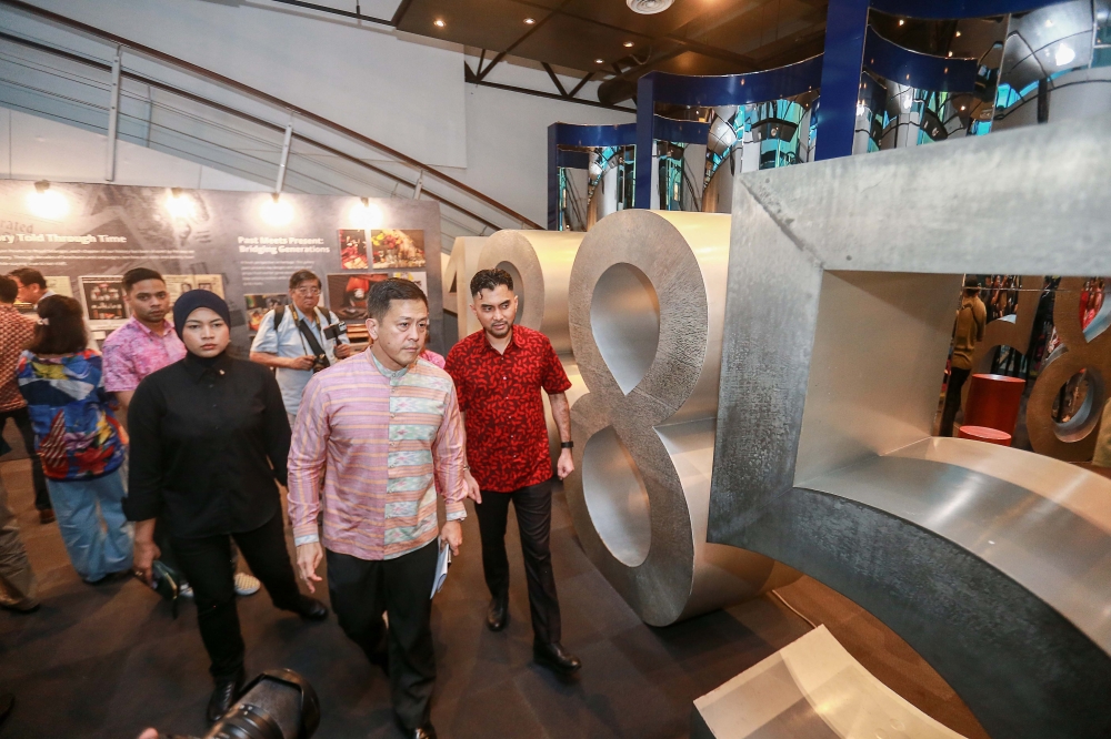 Royal Selangor International managing director Datuk Yong Yoon Li and Deputy Tourism, Arts and Culture Minister Khairul Firdaus Akbar Khan at Royal Selangor’s 140th anniversary celebration at the Royal Selangor Pewter Factory. — Sayuti Zanudin 