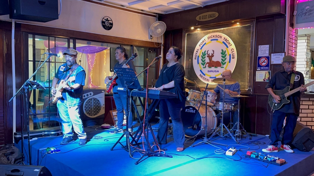 Agy Idrus, at drums, with the band ‘The RETROGROOVERS’ at Royal PD Yacht Club. —Photo courtesy of Agy Idrus