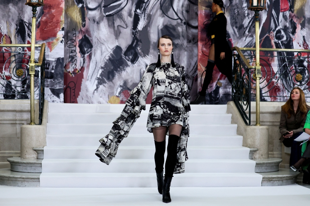 A model presents a creation during the Paul Costelloe show at London Fashion Week in London. — Reuters 