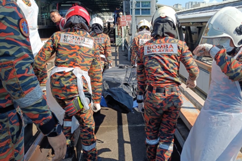 A body was found beneath the tracks at Titiwangsa LRT station this morning. — Picture courtesy of KL Fire and Rescue Department